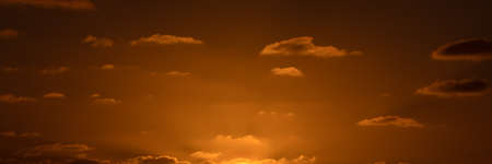 Beatiful sunset above the mediterranean sea. Sunrise with red and orange skies and the sun shiningの写真素材