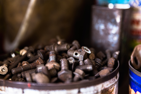 Old and rusty car parts in a junkyardの写真素材