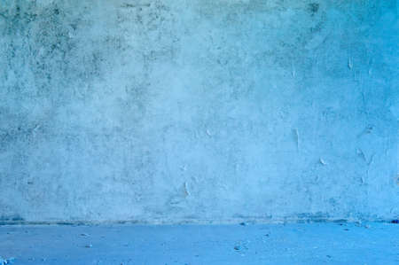 Old abandoned grungy blue wall の写真素材