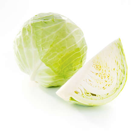 Whole cabbage and a part on white backgroundand の写真素材