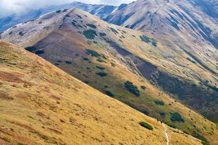 Tourists on mountain trail  The West Tatra Mountains, Carpathians  Nature reserve の写真素材