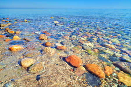 Beautiful seascape with coastal stones in the ocean  The Baltic coast, mediterranean sea, Poland の写真素材