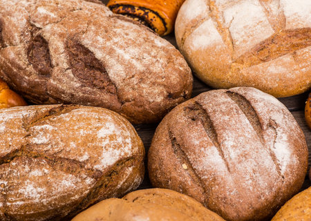 Many mixed breads and rolls shot from above.の写真素材
