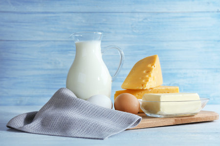 Different dairy products on wooden backgroundの写真素材