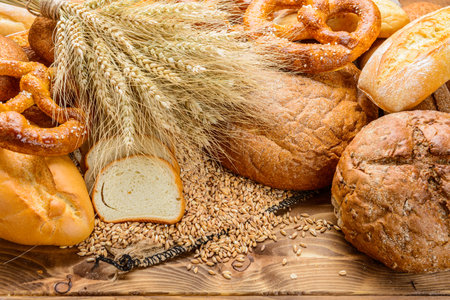 fresh bread  and wheat on the wooden