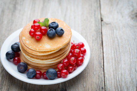 Pancakes. Stack of pancakes with fresh berry.の写真素材