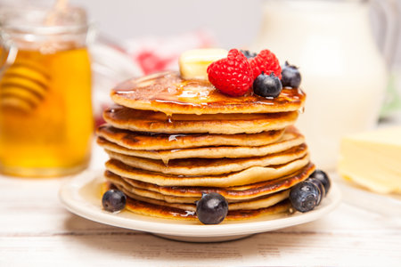 High pile of delicious pancakes with blueberryの写真素材