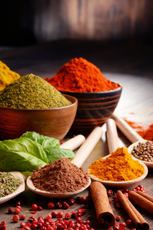 Variety of spices on kitchen table.の写真素材