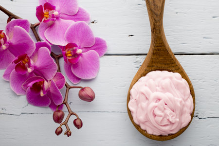 Pink orchid with buds. Greeting card.の写真素材