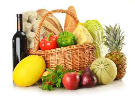 Composition with basket of food and wine isolated on a white backgroundの写真素材