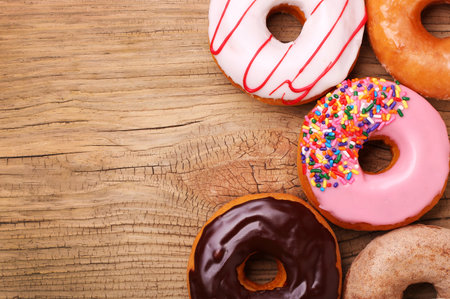 Donuts on wooden backgroundの写真素材