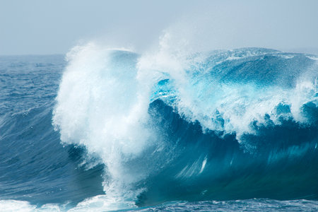 powerful ocean waves breaking natural backgroundの写真素材