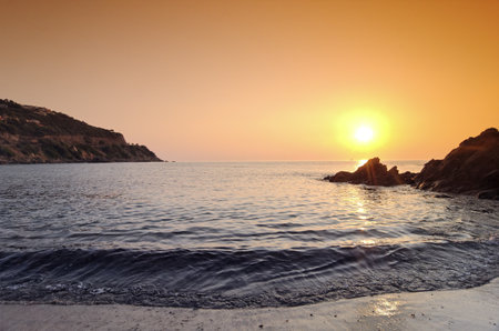 Sunset on the beach of the island of Crete, Greeceの写真素材