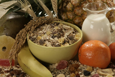 muesli with milk and fruits, healthy breakfast, close upの写真素材