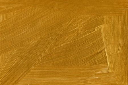 Gold paint brush strokes texture background. Abstract gold paint brush strokes.のeditorial素材