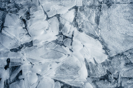 Pieces of ice on the river in winter, closeup of photoのeditorial素材