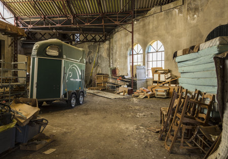 Vintage truck in an old warehouse, interior of an industrial building