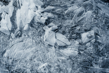 Ice texture on the frozen lake in winter, closeup of photoのeditorial素材