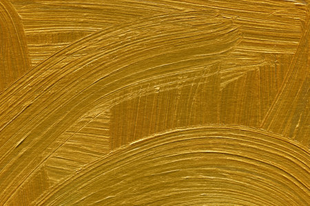 Gold paint brush strokes texture. Abstract background and texture for design.のeditorial素材
