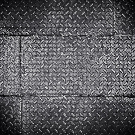 Metal texture with rhombus pattern. Grunge background.