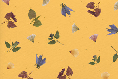 Watercolor autumn leaves on a yellow background. Seamless pattern.のeditorial素材