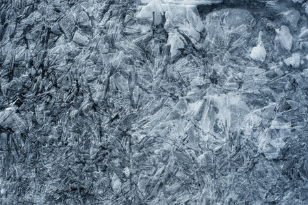 Frozen lake in the winter, close-up. Blue tonedのeditorial素材