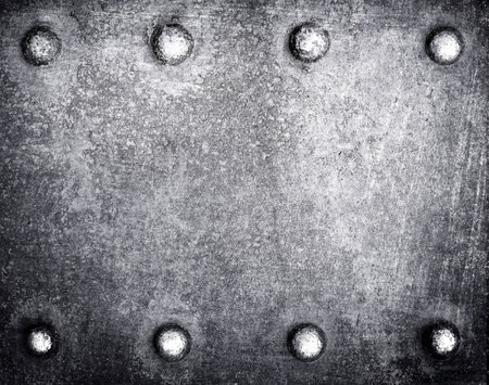 Metal plate with rivets in grunge style for background. Toned.のeditorial素材