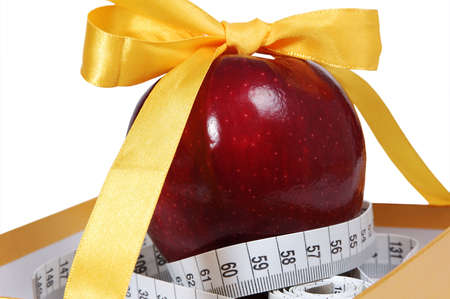 red apple in box with tape-line like giftの写真素材