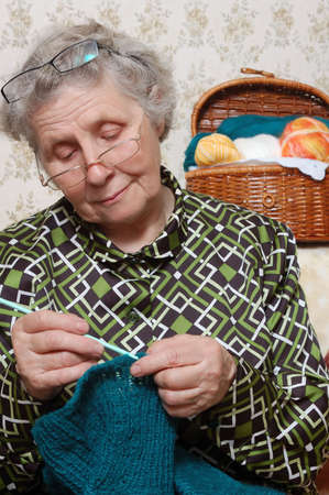 spectacled grandmother to crochet cardiganの写真素材