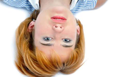 Lying attracrive young woman, isolated on white