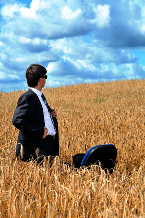 Young successful businessman looks afieldの写真素材