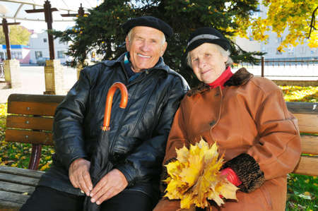 grandparent on bench in park