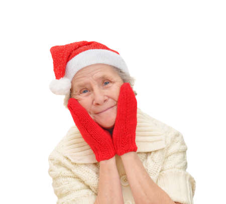 old lady in red Santa Claus hat and red mittens, Snow Maidenの写真素材