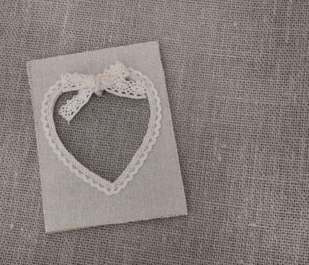 Heart shaped canvas frame on grey canvasの写真素材