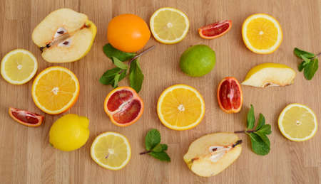 Mix citrus fresh fruit on the wooden tableの写真素材