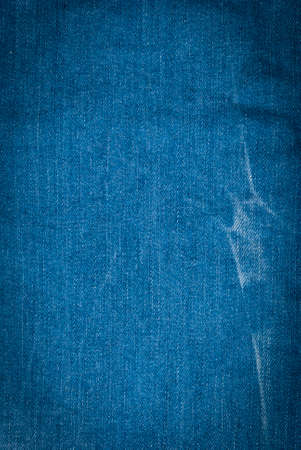 Blue denim background, detailed texture with vignetteの写真素材