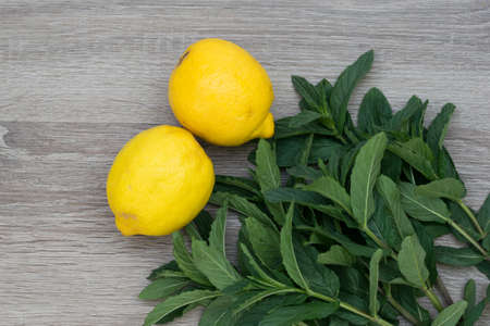 Lemon as on the wooden table food fruitの写真素材