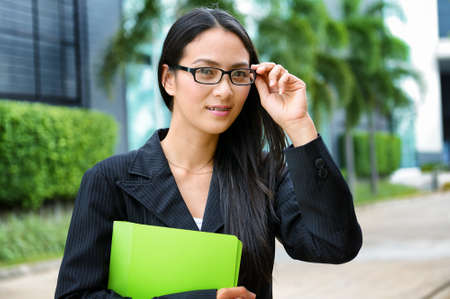 Portrait of asian business woman outdoor with glassesの写真素材