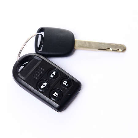 Car key with remote control on white background
