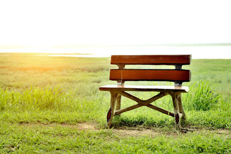 Concrete bench at river sideの写真素材