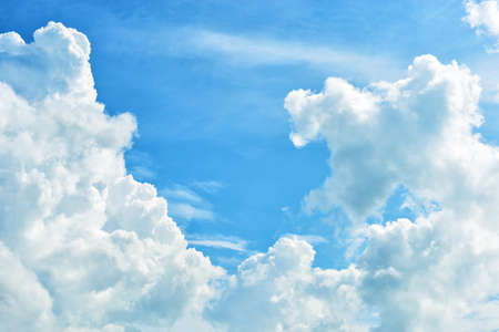 Blue sky and clouds backgroundの写真素材