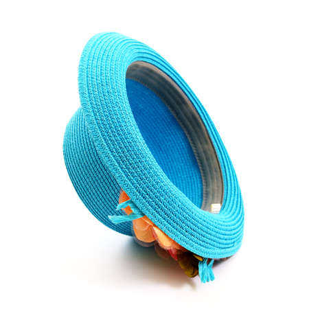 Pretty straw hat with flower on white backgroundの写真素材