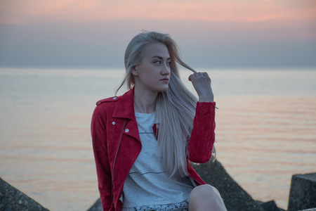 the beautiful blonde girl in outdoorの写真素材