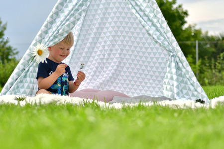 children playing in tentの写真素材