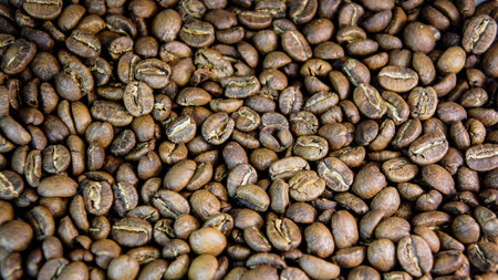 coffee beans. brown whole roasted fragrant delicious coffee beans. coffe pattern backgroundの写真素材