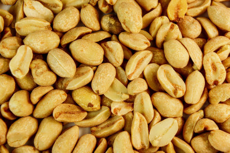 peanut. peanuts close up. roasted fragrant delicious salted grains of peanuts with seasoningの写真素材