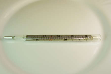 thermometer close up. medical device for measuring body temperature. thermometer on a white background. medical equipmentの写真素材
