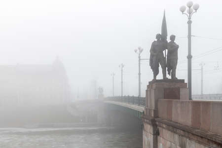 Historical image of Soviet sculptures on Green Bridge in fog symbolized Soviet occupationの写真素材