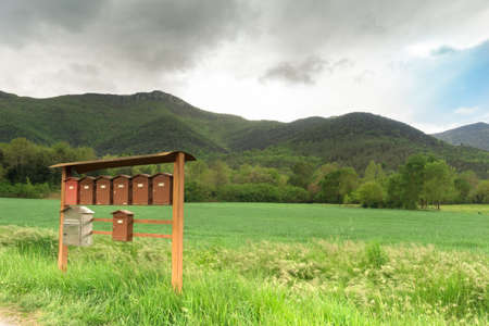 Raw of old post boxes on countryside of Catalonia, Spain