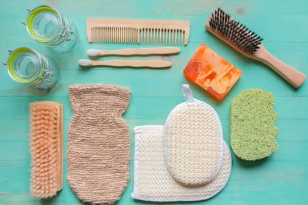 Reusable glass jars, bamboo toothbrushes, natural sponges, wooden comb, homemade solid soap, natural...